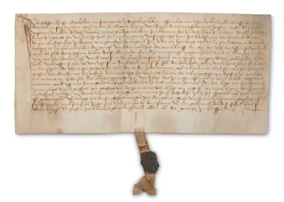 Alte Pergamenturkunde mit mittelalterlicher Schrift und Siegel, historische Dokumentation aus dem Mittelalter.